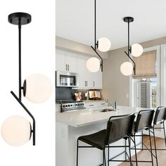 a kitchen and dining room with modern lighting fixtures in black, white, and grey colors