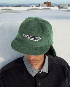 Keep your radar warm with the Lib Stone Legacy Flap Hat. This 5-panel unstructured gem boasts 100% polyester corduroy, an adjustable fit, and a lined neck flap for to keep your neck warm and protected from the sun. With its elastic cinch, it fit most heads. Featured here in dark pine. - Features

 - 100% Polyester
 - 5 panel unstructured adjustable with neck flap
 - Unstructured Corduroy with elastic cinch
 - Front graphic logo embroidery Flap Hat, Graphic Logo, Logo Embroidery, Neck Warmer, Embroidery Logo, The Sun, Sun, Elastic, Embroidery