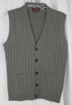 Original Vintage Hudson's Men's Store Vest  Ooh my! This is a true original piece and it is so easy to wear. Versatile to put on, it is the perfect addition to your vintage closet. Size: men's small Gray 100% acrylic Cable knit details Button front 2 pockets Beautiful condition, seldom worn Coming from our pet free, smoke free facility Returns: This may be returned within 30 days for a refund. The item must arrive in the same condition is was shipped in.  We are a 100% smoke free environment. We 1920s Fashion Men, 1950s Mens, Sweater Vest Mens, Vintage Closet, Men Store, Vintage Vest, Closet Size, Men Vintage, Men's Knit