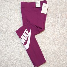 Brand New With Tags An Absolute Essential. These Women's Nike Leggings Offer A High-Rise Design And A Comfortable Stretch Waistband. Stretchy, Sweat-Wicking Fabric And A Nike Print Make These An Easy Choice For Everyday Wear. Product Features Soft And Stretchy Fabric Helps Wick Sweat Away From Your Body To Help Keep You Feeling Cool And Dry Throughout The Day Printed Graphic At The Calf Lets You Rep The Brand In Style Nike Leggings, Nike Pants, High Waisted Leggings, Nike Sportswear, Stretchy Fabric, Jumpsuits For Women, Product Features, Nike Women, Pant Jumpsuit