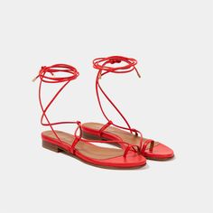 Gladiator Lipstick Red Nappa Sandal Elegant gladiator inspired lace-up flat thong sandal that ties at the ankle. Beautifully crafted in Italy with a touch of cushion to soften your step. Can't find your size? E-mail us at letschat@sclarandis.com Heel height: flat Made in: ItalyItalian leatherLeather liningLeather soleStyle number: 220303 Fit: whole sizes only – for ½ sizes order next size up. Note: this is a handcrafted product, some slight variation in color and material may occur. Red Flat Sandals, Tie Up Sandals, Red Flats, Lipstick Red, Red Tie, Positano, Lace Up Flat, Thong Sandals, Flat Sandals