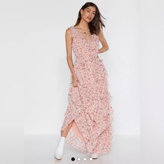 Grow Above And Beyond. This Dress Features A Floral Print Throughout, V-Neckline, Ruffle Detailing, Button Closure At Back, Wrap Design, Tie Closure, And Maxi Silhouette. Fabric: 100% Polyester. Machine Wash Flirty V-neck Maxi Dress For Day Out, V-neck Ruffle Hem Maxi Dress For Date Night, Tiered Maxi Dress For Spring Date Night, Ruffle Maxi Dress, Ruffled Maxi Dress, Floral Ruffle, Above And Beyond, Floral Print, Floral Prints