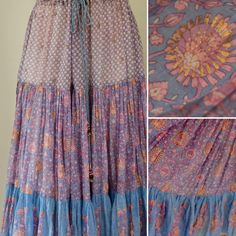 Adini Block printed Cotton Gauze Indian Skirt. This is a stunning colourway. classic draw sring with bells waist. calf length tiered skirt with vibrant gold painted highlights. One size measures  across waist max-20in across hips-24in length -34in Excellent condition fabric has a small tear on inside of waistband. nothing to affect the wearability. Blue Ruffled Maxi Skirt, Blue Bohemian Tiered Bottoms, Bohemian Blue Tiered Bottoms, Blue Tiered Gathered Skirt, Bohemian Tiered Multicolor Skirt, Painted Highlights, Indian Skirt, Indian Block Print, Tier Skirt