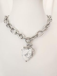 Chunky Silver Necklace with Ring Clasp and Large Heart Pendant | Heart Necklace with Howlite Stone | Stainless Steel Jewelry | Statement Silver Heart Necklace Description: 🌟 Add a touch of sophistication and style to your collection with our Chunky Silver Necklace with Ring Clasp and Large Heart Pendant. This stunning necklace features a large heart pendant crafted from high-quality stainless steel, paired with a howlite stone that adds a touch of natural beauty and serenity. The eye-catching d Silver Large Heart Pendant Jewelry, Silver Heart Pendant Chain Necklace With Chunky Chain, Chunky Silver Heart Necklace, Unique Heart-shaped Necklace With Large Pendant, Sterling Silver Heart-shaped Jewelry With Large Pendant, Heart Stone Necklace, Chunky Silver Necklace, Howlite Stone, Silver Heart Necklace