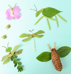 paper flowers, leaves and insects on a blue background