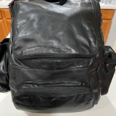 This Winn International Leather Backpack Is New With Tags Attached. It Has Never Been Used. See Pictures For Approximate Size Measurements. This Is A Really Nice Soft Leather Backpack. Casual Travel Satchel With Leather Backing, Casual Leather-backed Satchel For Travel, Rectangular Soft Leather Backpack For Travel, Rectangular Soft Leather Travel Backpack, Black Rectangular Leather Backpack For Travel, Black Soft Leather Backpack For Travel, Soft Leather Tote Backpack For Travel, Travel Backpack In Soft Leather, Casual Black Bag With Leather Backing