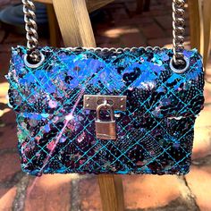 It’s Filled With Dazzling Blue, Green And Pink Sequins And Can Be Worn As A Shoulder Bag, A Cross Body Or A Clutch. This Bag Would Be Perfect With A Pair Of Jeans Or With An Evening Gown. It’s Very Special It’s Never Been Worn And Has Tags. Pink Sequin, Kurt Geiger, Louis Vuitton Twist Bag, Evening Bags, Evening Gowns, Blue And Purple, Bag Lady, Shoulder Bag, Purple