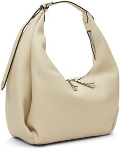 Grained leather shoulder bag in off-white. · Adjustable shoulder strap · Two-way zip closure · Patch pockets at interior · Faux-suede lining · H15.5 x W11 x D5.75 Supplier color: Milk grain White Leather Hobo Bag With Zipper Closure, Off White Belt, White Belt, Travel Collection, Personal Shopping, Travel Luggage, Shoulder Bag Women, Luggage Bags, Faux Suede