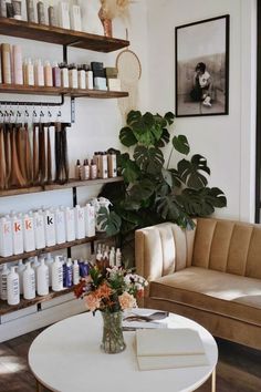 a living room filled with furniture and lots of bottles