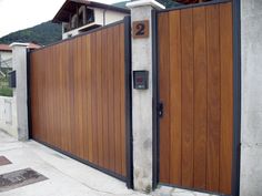 a large wooden gate with numbers on it