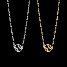 two necklaces with the same design on each side, one in gold and one in silver