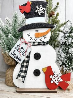 a snowman with a hat and scarf