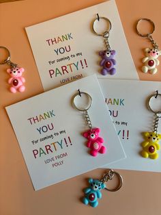 four key chains with teddy bears on them and thank you for coming to my party