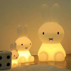 two bunny lamps sitting next to each other