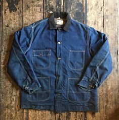 A rare and beautiful Vintage 1970s Sears Work Clothing Blanket Lined Denim Barn/Chore Jacket. Corduroy collar, two hand pockets and two breast pockets.  Size: Large  Wear: Very good condition  Pit to pit: 26 Inch Collar to hem (on back of item): 32 Inch  Arm: 25.5 Inch Shoulder: 19.5 Inch   We lovingly hand pick every vintage item for its age, uniqueness, coolness and style.  hope you like our finds. All of our items are vintage and may show signs of previous wear. Any significant wear, damage or marks will be photographed however we love a bit sunfade and a vintage repair, they just add character for us. We have a store in Brighton and you can also follow us on Instagram to keep up with our latest finds @salvageandsawdustco Vintage Pre-washed Cotton Denim Jacket, Vintage Pre-washed Medium Wash Denim Jacket, Vintage Pre-washed Denim Blue Outerwear, Vintage Denim Outerwear With Flap Pockets, Vintage Indigo Outerwear Pre-washed, Vintage Denim Blue Outerwear With Pockets, Vintage Dark Wash Long-sleeved Outerwear, Vintage Dark Wash Long Sleeve Outerwear, Vintage Dark Wash Outerwear With Pockets