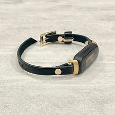 Black Leather & Gold Fitbit Inspire 3 Bracelet Slim Band! Classic 8mm Genuine Leather Strap with Adjustable Buckle! Designed And Handmade by Simeon D Jewelry Studio! Adjustable Size Bracelet Perfectly Tailored to Fit Your Wrist!  Please Measure Your Wrist Before You Purchase Your Gorgeous Bracelet! Not For Other Models. Fitbit Tracker Is NOT Included Follow my Studio on Social Media for Updates & New Designs Make a Fashion Statement Every Place You Go! Get Tons of Compliments Wearing Your Beauti Smart Jewelry, Jewelry Studio, Gorgeous Bracelet, Beautiful Bracelet, Arm Band, Fashion Statement, Fitbit, Soft Leather, Leather Straps