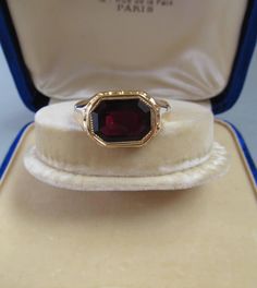 Antique Gold and Garnet Signet Ring - 18K Gold With an 18K gold Hungarian hallmark that was used from 1867. This ring is in very good condition. The head of the ring is 0.497 inches (12.65 mm) long and 0.685 inches (17.42 mm) wide Size of the stone: 0.38 inches (9.58 mm) long and 0.53 inches (13.43 mm) wide Inside diameter: 0.88 inches (22.6 mm) Size: USA 13.5 UK Z1-Z2 EU 71 Weight: 9.7 grams The box is not part of the auction. Free world-wide shipping by FedEx. Heirloom Intaglio Signet Ring For Formal Events, Victorian Gold Signet Ring With Gemstone, Antique Engraved Yellow Gold Ring With Gemstone, Antique Signet Ring With 17 Jewels For Anniversary, Yellow Gold Estate Jewelry, Estate Style Formal Rings With Gemstones, Heirloom Intaglio Rings For Formal Occasions, Antique Gold Signet Ring With Gemstone, Antique Engraved Gold Ring With Gemstone