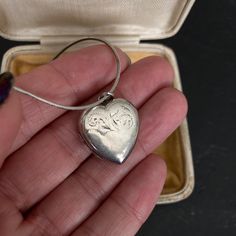 Beautiful 1970s VINTAGE SILVER Locket on a sterling silver 18 inch Snake Chain. A lovely heart shaped Sterling Silver Engraved Pendant Necklace. 70s Vintage Silver Jewelry offered by Isobel Vintage Jewels on Etsy Style: Vintage 1970s real silver locket. A lovely heart 70s side opening sterling silver locket big enough for putting little photos inside.  Colour: silver  Size: 2 x 2cm and 18 inch snake chain Condition: Excellent condition Approximate Date: 1970s Check out my other lovely silver ite Vintage Charm Heart Pendant Jewelry For Anniversary, Classic Heart Jewelry For Collectibles, Classic Heart-shaped Collectible Jewelry, Vintage Heart Pendant Necklace For Anniversary, Classic Heart Shaped Collectible Jewelry, Collectible Heart-shaped Hallmarked Jewelry, Heart Pendant Necklace With Vintage Charm For Anniversary, Anniversary Heart Pendant Necklace With Vintage Charm, Vintage Charm Heart Pendant Necklace For Anniversary