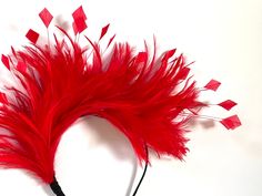 Red feather fascinator This red feather fascinator is made from high-quality feathers.  A feather fascinator is attached to a black silk-covered metal headband. Feather Fascinator is very stylish and at the same time simple. You can wear it on any occasion like Christening, Wedding, Royal Ascot, or Kentucky Derby races. This piece is timeless. I hope you enjoy it! Kristine xx please have a look at my other fascinators https://www.etsy.com/uk/shop/KristineRosahats?ref=simple-shop-header-name&list Red Feathered Fascinator For Wedding, Red Feathered Wedding Fascinator, Red Headband Headpieces For Carnival, Red Wedding Fascinator With Feathers, Red Cape Dress, Wedding Royal, Kentucky Derby Fascinator, Lace Crowns, Derby Fascinator