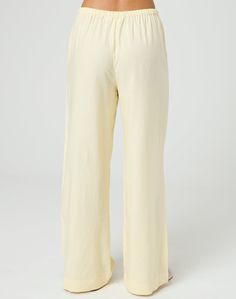 These tie waist pants feature a relaxed leg style and a mid rise fit. Wide-leg Pants With Elastic Waistband For Daywear, Relaxed Straight Leg Bottoms With Elastic Waistband, Loungewear Ankle-length Pants With Tie Waist, Casual Wide Leg Pants With Tie Waist, Chic Loungewear Pants With Tie Waist, Straight Pants With Tie Waist For Loungewear, Straight Loungewear Pants With Tie Waist, Loungewear Straight Pants With Tie Waist, Relaxed Wide Leg Trousers With Elastic Waistband