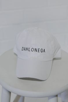 All DU Exclusive items are excluded from all coupons and promotions Calling all Dahlonega residents, the Dahlonega Embroidered Hat was made just for you! This cute hat is made of a soft cotton construction. It has a rounded top and a slightly rounded brim with "Dahlonega" embroidered on the front! Available in 3 colors. Adjustable Strap Embroidered 100% Cotton Spot Clean with Damp Cloth or Sponge One Size Fits Most Cute Hat, Embroidered Hat, Exclusive Dress, Embroidered Hats, Cute Hats, Baseball Hats, Dress Up, Hats, Color