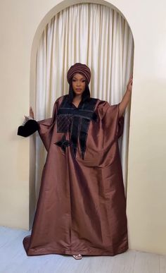 Made with high quality mikado fabric with embroidery.  Size: One size fits US Size 8 to 24 Lenght: 60 inches  Comes with the turban for free This mikado silk boubou is an elegant African kaftan featuring intricate embroidery along the neckline, adding a touch of sophistication and cultural flair to the garment.  Crafted from luxurious mikado silk, this boubou offers a combination of comfort and style, perfect for special occasions or formal gatherings. The long embroidery on the neck enhances th Silk Boubou, Mikado Silk, African Embroidery, Mikado Fabric, African Kaftan, Dress Rich, Nigerian Outfits, Nigerian Dress, African Turban