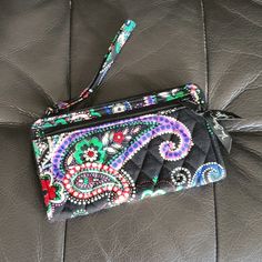 Bnwot- Beautiful Floral And Paisley Design. Black, Purple, And Red Combo Fabric Wallet. Has A Wristlet Option. No Issues. Casual Black Wristlet For Everyday Use, Vera Bradley Backpack Purple, Vera Bradley Wallet Lanyard, Vera Bradley Bifold Wallet, Vera Bradley Wallet, Fabric Wallet, Id Wallet, Vera Bradley Annual Outlet Sale, Floral Pocket