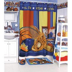 a child's basketball themed bathroom with blue and yellow shower curtain, rugs and toys