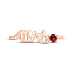 Mark a bride's change of status with this charming ring featuring "Mrs." spelled out in elegant 10K rose gold letters. A garnet perfectly punctuates the word art, adding a pop of color and making it a delightful piece to highlight the wedding colors or unique sense of style of the wife-to-be. Mrs Ring, Wife To Be, Gold Letters, Word Art, Wedding Colors, Garnet, Color Pop, Sense, Rose Gold