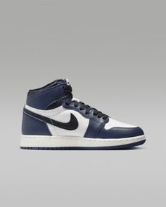 Familiar but always fresh, the iconic Air Jordan 1 is remastered for today's sneakerhead culture. This Retro High OG version goes all in with premium leather, comfortable cushioning and classic design details. Shown: Midnight Navy/White/Sail/Black Style: FD1437-401 Jordans For Boys, Armory Navy Jordan 1s, Air Jordan 1 Mid Navy, Blue High-top Leather Jordan Shoes, Jordan 1 Retro Metallic Navy, Jordan 1 Mid Armory Navy, Nike Jordans