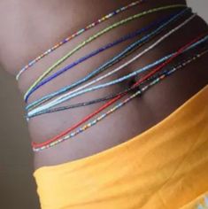 Colorful bohemian style African Waist-beads Over 22 colors to choose from Choose options 1-22 as seen on picture for color choice Unisex Individually packaged Environmental friendly acrylic, resin, lucite Please make sure your shipping address is CORRECT or USPS will not SHIP If it cannot be verified In there system, I will then have to contact you which will delay your shipping time! **Due to sanitary purposes we DO NOT accept Returns or Exchanges! Bead Vendors, Jóias Body Chains, Waist Beads African, Waist Jewelry, Ikat Pinggang, Body Chains, Rice Bead, Waist Beads, Layered Chains