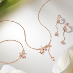 Savor the charm of our Lily of the Valley Necklace. Inspired by Sweden's enchanting bloom, it conveys elegance and morality. Fragrant and repellent of maliciousness, it boosts jubilant vigor. Embrace this sylvan treasure and shine with assurance and harmony. Jewellery should be kept away from corrosive chemicals, such as perfume, body lotions, hairspray, or detergent.  If your jewellery gets wet, dry it off with a soft cloth.  You should also remove your jewellery while bathing, swimming, shower Luxury Rose Gold Necklaces For Mother's Day, Meteorite Necklace, Meteorite Jewelry, Body Lotions, Mother Of Pearl Necklace, Gold Necklace Women, Earring Sale, Mens Jewelry Bracelet, Rose Gold Necklace