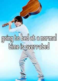 a man holding a guitar with the caption going to bed at a normal time is overrated