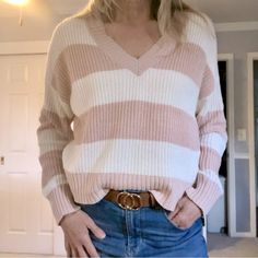 “American Eagle” Brings You This Great Sweater. It Is A Soft Cotton-Acrylic Shaker Knit Sweater. It Features A Wide Blush Pink & Creamy-White (Not Pure White!) Stripe, A V-Neck And A Rounded, Slight High-Low Bottom. It Is A Junior Size S, But It Fits Like A M (See Pics For Measurements). Pre-Loved In Excellent Condition! Pink V-neck Sweater For Winter, Pink Long Sleeve V-neck Sweater, Trendy Pink Sweater For Layering, Pink Knit Sweater For Layering, Pink Knit V-neck Top, Pink Soft Knit Sweater For Layering, Trendy Pink V-neck Sweater, Pink V-neck Soft Knit Top, Cozy Pink V-neck Sweater