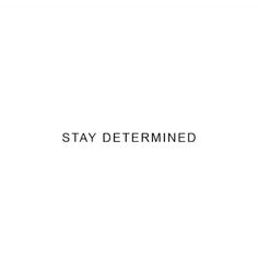 the words stay determined written in black on a white background