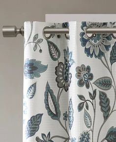 a curtain with blue and white flowers on it