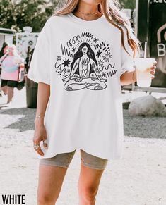 Channel your inner peace with this inspired yoga tee - featuring a hand drawn graphic of a woman with flowing shapes that celebrate movement, mindfulness, and wellness on and off the mat. We use professional quality DGT printing on all our apparel. Direct-to-garment, or DTG, is a high quality printing method that sprays ink directly onto the garment so there is no peeling or cracking. This fabulous graphic will be printed on a Comfort Colors Unisex T-Shirt. Please refer to the size charts in the images for the best fit.  Estimated Production Time: 1-5 days Estimated Shipping Time: 2-5 days 100% cotton shirt  Machine wash: cold  Non-chlorine: bleach as needed Tumble dry: low heat Iron, steam or dry: medium heat Do not dry clean Typography Shirt Design, Yoga Lover Gift, Yoga Tees, Lotus Pose, Yoga Design, Yoga Shirt, Yoga Instructor, Yoga Tshirt, Typography Tshirt