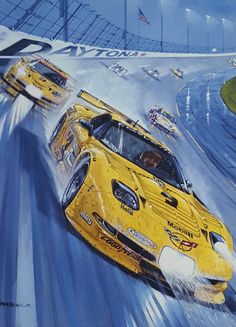 two yellow race cars racing on a track