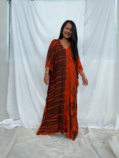 MALA handworks MaLa Kaftan in Earthy Red and Umber Brown Tie Dye Long Sleeve Batik Print Kaftan For Summer, Long Sleeve Batik Print Kaftan For Festivals, Summer Long Sleeve Batik Print Kaftan, Red Batik Print Kaftan For Summer, Flowy Tie Dye Kaftan With Natural Dye, Summer Red Batik Print Kaftan, Festival Tie Dye Kaftan With Batik Print, Bohemian Maxi-length Kaftan With Natural Dye, Flowy Multicolor V-neck Kaftan