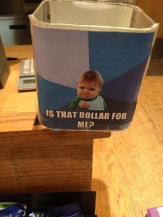 a canister with an image of a baby on it that says is that dollar for me?