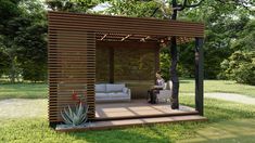 an outdoor living area in the middle of a field