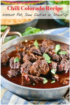 a bowl filled with beef stew and garnished with cilantro