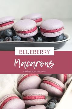 blueberry macarons with red and white frosting on them in a bowl