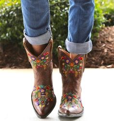 About: The Cowgirl Embroidery Boots are beautifully detailed with colorful floral embroidery etched in pink, purple, teal, orange, yellow and green thread. The 8 inch shaft is the perfect height for sundresses, but the Cowgirl Embroidery Boots will also look amazing with blue jeans. Handcrafters seriously brought these little cowgirl boots to life. If you are looking to make a bold statement, step into the cowgirl boots and you’ll be turning heads for sure. Specs: Fits true to size, take your no Short Cowgirl Boots, Embroidery Boots, Luxury Embroidery, Boots Luxury, Pu Boots, Yellow Shoes, Boot Types, Shoes Comfortable, Women Boots