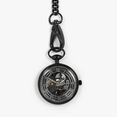 The extraordinary skeleton movement and inner mechanisms are showcased through a highly-polished glass case featuring 17 intricately placed jewels and made from brass with IP black coating. A built in safety mechanism ensures excessive winding will not damage the movement and each time the watch is fully winded, it will last for 30+ hours. Our pocket watch comes with a pocket chain finished with lobster clasps and a keyring loop to be worn in your pocket or stand alone. The perfect luxury gift t Modern Black Watch With Rotating Bezel, Black Formal Watch With Rotating Bezel, Formal Black Watch With Rotating Bezel, Black Watch With Rotating Bezel, Formal Metal Pocket Watch With Skeleton Dial, Black Metal Automatic Watches, Black Skeleton Dial Watch As Gift, Black Watch Accessories With Metal Dial, Black Watches With Rotating Bezel For Gifts