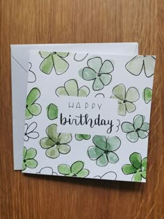 a card with shamrocks on it that says happy birthday