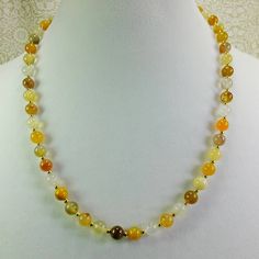 This is a beautiful agate stone beaded necklace. The beads are natural translucent earth tones, in shades of cream, tan, beige, yellow, and brown. I used small gold plated beads, coated multi-strand wire and a lobster claw clasp. I mail necklaces in gift boxes in padded envelopes. Beige Birthday, Deputy Wife, Brown Agate, Wife Necklace, Police Wife, Number Necklace, Yellow Necklace, Stone Beaded Necklace, Bead Work Jewelry