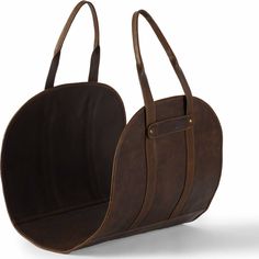 two brown leather purses sitting next to each other