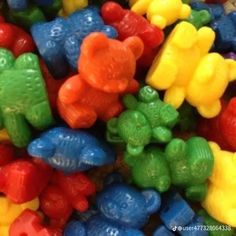 there are many different colored gummy bears together