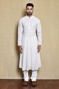 White bundi with tonal floral embroidery. Comes with grey chikankari embroidered anarkali and white churidar. - Aza Fashions Anarkali Traditional Wear With Naqshi In Cotton, Navratri Anarkali Sherwani With Chikankari Embroidery, Anarkali Style White Sherwani With Naqshi Detailing, Anarkali Style White Sherwani With Naqshi, White Anarkali Sherwani With Naqshi, Anarkali Sherwani With Chikankari Embroidery, Anarkali Style Cotton Sherwani With Chikankari Embroidery, Cotton Bandhgala For Wedding And Navratri, Designer Anarkali Nehru Jacket With Chikankari Embroidery